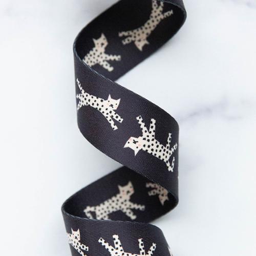 1.5" Snow Leopard Webbing in Black by Rashida Coleman-Hale for Stitch Supply