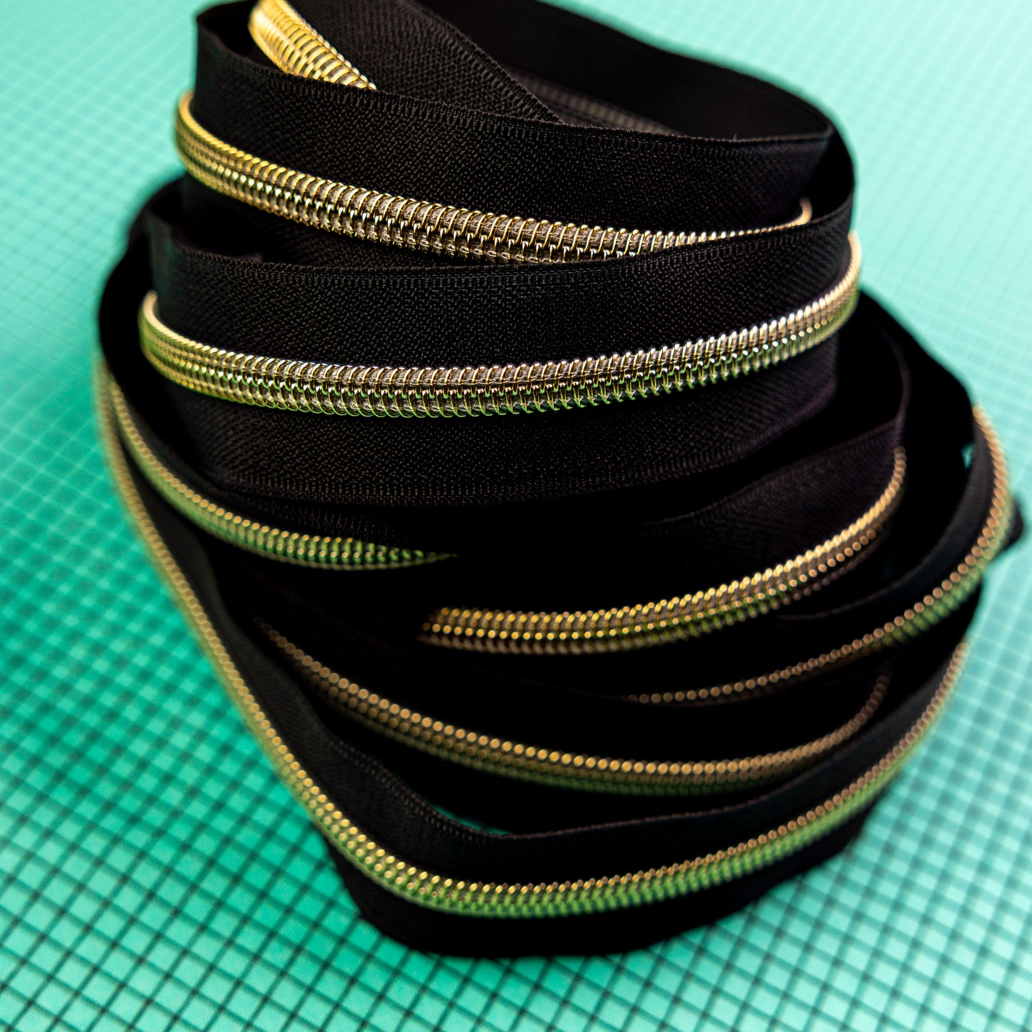 Sassafras Lane Black Zipper Tape with Faux Metal Nylon Teeth in Gold Finish