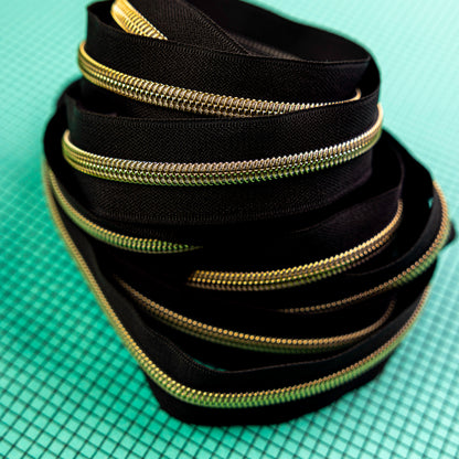 Sassafras Lane Black Zipper Tape with Faux Metal Nylon Teeth in Gold Finish